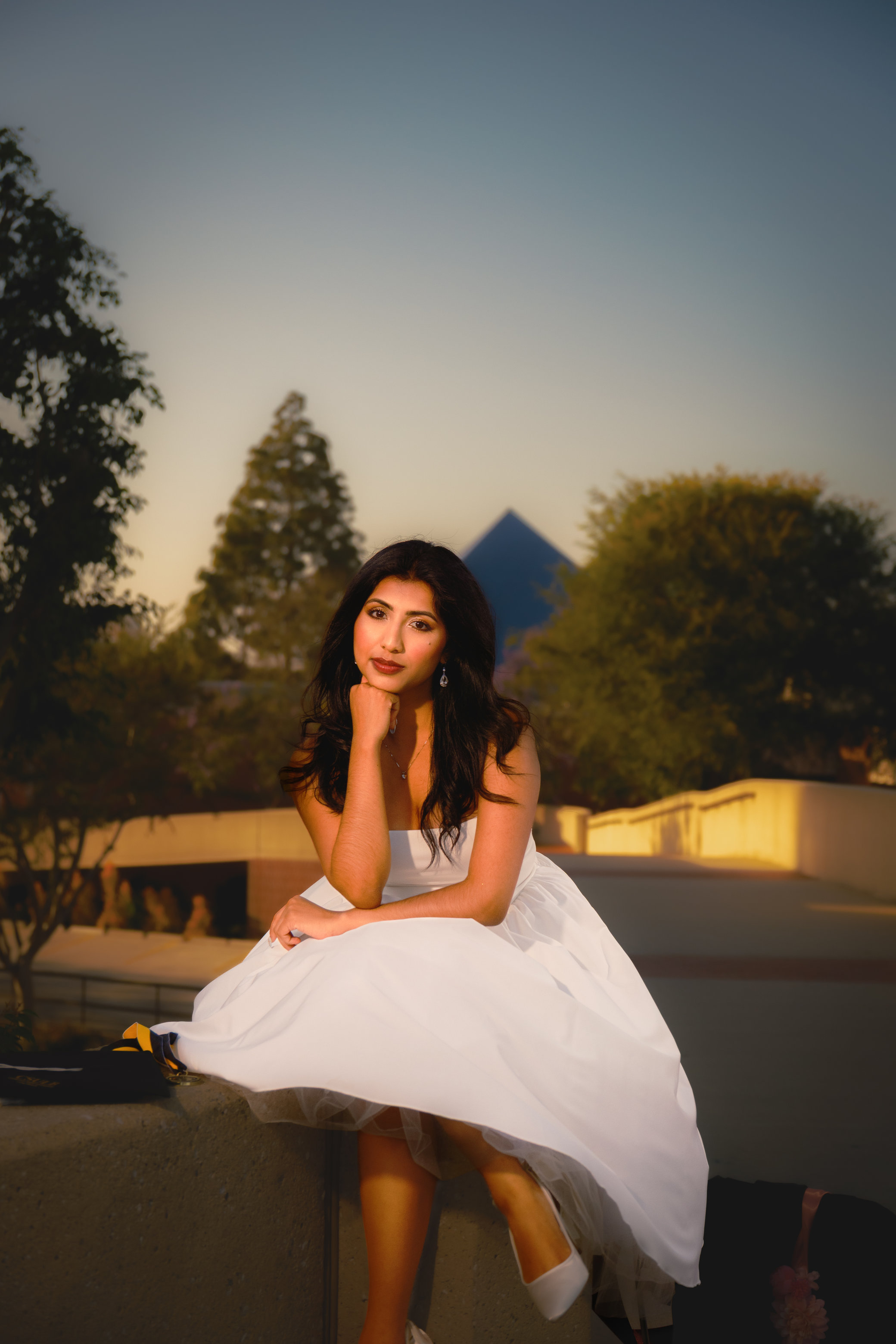 Woman posing on guardrail